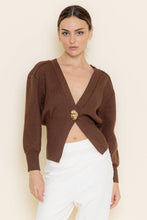 Load image into Gallery viewer, Woman wearing a brown cropped cardigan with a gold button on a beige background
