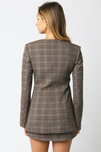 Plaid blazer and skirt set on a white background