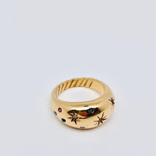 Load image into Gallery viewer, 18K gold-plated stainless steel dome ring featuring colorful cubic zirconia stones and engraved celestial starburst details.
