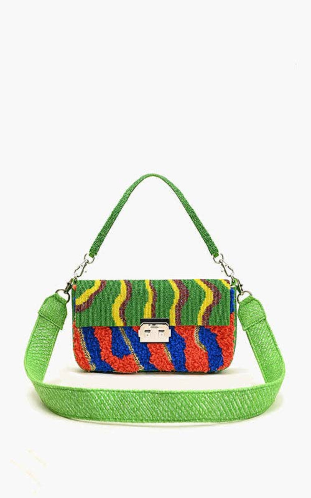 Colorful handbag with a green strap on a white background