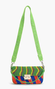 Colorful woven handbag with a green strap on a white background