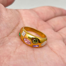 Load image into Gallery viewer, 18K gold-plated stainless steel dome ring featuring multicolor cubic zirconia stones in pink, green, purple and clear geometric shapes.
