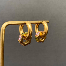 Load image into Gallery viewer, 18K gold-plated stainless steel huggie earrings featuring colorful pink and green zircon accents in geometric settings.
