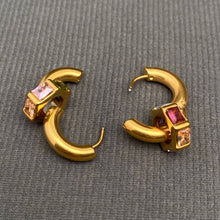 Load image into Gallery viewer, 18K gold-plated stainless steel huggie earrings featuring colorful pink and green zircon accents in geometric settings.
