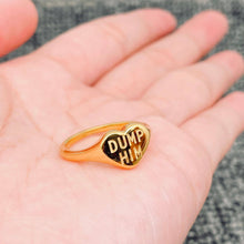 Load image into Gallery viewer, 18K gold-plated stainless steel heart signet ring featuring raised “DUMP HIM” lettering in a high-polish finish.
