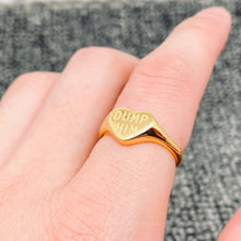 Load image into Gallery viewer, 18K gold-plated stainless steel heart signet ring featuring raised “DUMP HIM” lettering in a high-polish finish.
