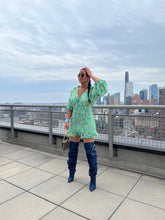 Load image into Gallery viewer, Our blue and green Floral Smocked Shirt Dress is fun, chic and feminine. This sweet dress features a collared neck, button closure, a decorative smocked skirt with a pretty frill at the hem, and is sure to become one of your go-to favorites! Dress it up or down!

