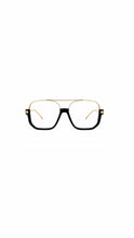 Load image into Gallery viewer, Black and gold oversized aviator glasses featuring geometric square frames, lightweight metal accents, and a modern statement eyewear design.
