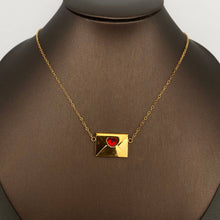 Load image into Gallery viewer, Gold-plated envelope pendant necklaces, including the red heart zircon version with a polished gold finish and delicate chain.
