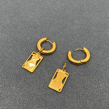 Load image into Gallery viewer, 18K gold-plated stainless steel huggie earrings with rectangular sculptural female body charms and a high-polish finish.
