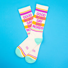 Load image into Gallery viewer, Cream crew socks with teal heel and toe featuring “Good Moms Say Bad Words” text and colorful stripe accents.

