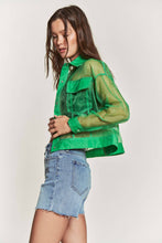 Load image into Gallery viewer, Woman wearing a green sheer jacket over a denim outfit on a white background
