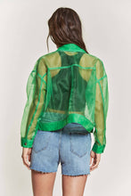 Load image into Gallery viewer, Person wearing a green sheer jacket over a denim outfit on a plain background
