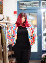 Load image into Gallery viewer, Add a pop of color to your look with our Multicolor Floral Quilted Jacket! Its vibrant design and runway inspired style will make you stand out from the crowd. Elevate your look and turn heads with this statement piece.
