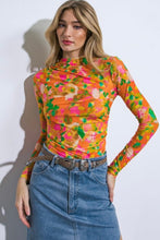Load image into Gallery viewer, Designed to make a statement, this Floral Mesh Top boasts a unique combination of floral patterns on a breathable mesh fabric. The long sleeves provide a touch of grace, making it the perfect choice for both casual events and special occasions. Embrace the allure of this versatile top that effortlessly transitions from day to night.
