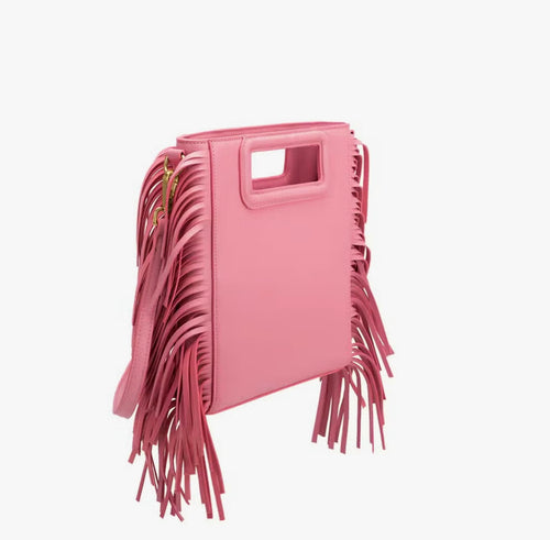 Our Pink Crossbody Tassel Bag is chic, feminine and unique with a rectangular shape and handle. This pretty crossbody was made to be flaunted and seen. Designed with a fringe trim, this structured handbag features an exterior zip pocket that keeps cards and tickets secure while also keeping them within arms reach. Made with recycled vegan leather.