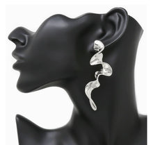 Load image into Gallery viewer, Our Pleated Metal Drop Earrings are interesting and chic. They come in silver or gold and are excellently crafted with lead compliant plated metal. These stunning and unique earrings hang to 2.27&quot; and are very light weight.
