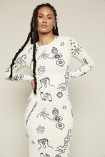 Load image into Gallery viewer, The Doodle Print Black &amp; White Maxi Dress is a stunning long-sleeved, fitted dress that effortlessly combines elegance with an edge. Featuring a chic slit and a striking black-and-white scribble print, this maxi dress is made entirely from recycled fabric, offering both style and sustainability. Perfect for making a bold statement at any event.
