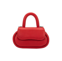 Load image into Gallery viewer, Meet our Cherry Red Structured Bag, the epitome of fashion and sustainability. This small round-top handle bag, made from recycled vegan leather, is your eco-conscious style statement. Wear it comfortably as a crossbody bag using the adjustable strap for hands-free convenience.
