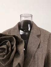 Load image into Gallery viewer, Introducing the Tweed Blazer with 3D Flower—a chic blend of classic and bold! Crafted from luxurious twill woolen fabric, this single-button blazer features a notched lapel and a stunning oversized detachable 3D flower that adds a dramatic flair. Perfect for making a statement, it combines sophistication and uniqueness, allowing you to switch up your look with ease. Dress it up for work or a night out—this piece guarantees to turn heads! Available now in women&#39;s sizes.
