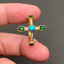 Load image into Gallery viewer, 18K gold-plated cross statement ring featuring green stones, clear cubic zirconia accents and a turquoise-blue center stone.
