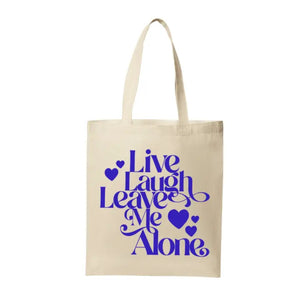 Introducing the "Live Laugh and Leave Me Alone" tote bag—a bold statement piece for those who value their personal space. Crafted from 100% cotton, this natural toned&nbsp; tote features a striking blue print and a comfortable 12.5-inch handle, making it both stylish and practical for everyday use.