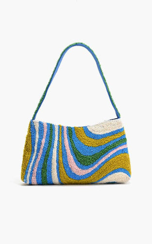 Multicolored striped tufted handbag on a white background.