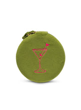Load image into Gallery viewer, Round olive green velvet jewelry travel case with embroidered pink martini glass, zip-around closure, built-in mirror, ring rolls, and compartments for storing rings, earrings, necklaces, and bracelets.
