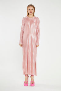 Step into timeless elegance with our Pink Plisse Maxi Dress. This stunning piece features long sleeves and a beautifully textured plisse fabric that drapes effortlessly. Its retro-inspired design exudes femininity, making it perfect for both day and evening occasions. Whether you're attending a garden party or a chic dinner, this dress ensures you make a graceful statement every time.