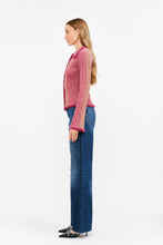 Load image into Gallery viewer, Woman wearing a Glam Expressway pink knitted cardigan and blue jeans on a white background
