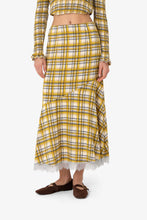 Load image into Gallery viewer, Yellow plaid midi skirt with lace trim hem worn by model.
