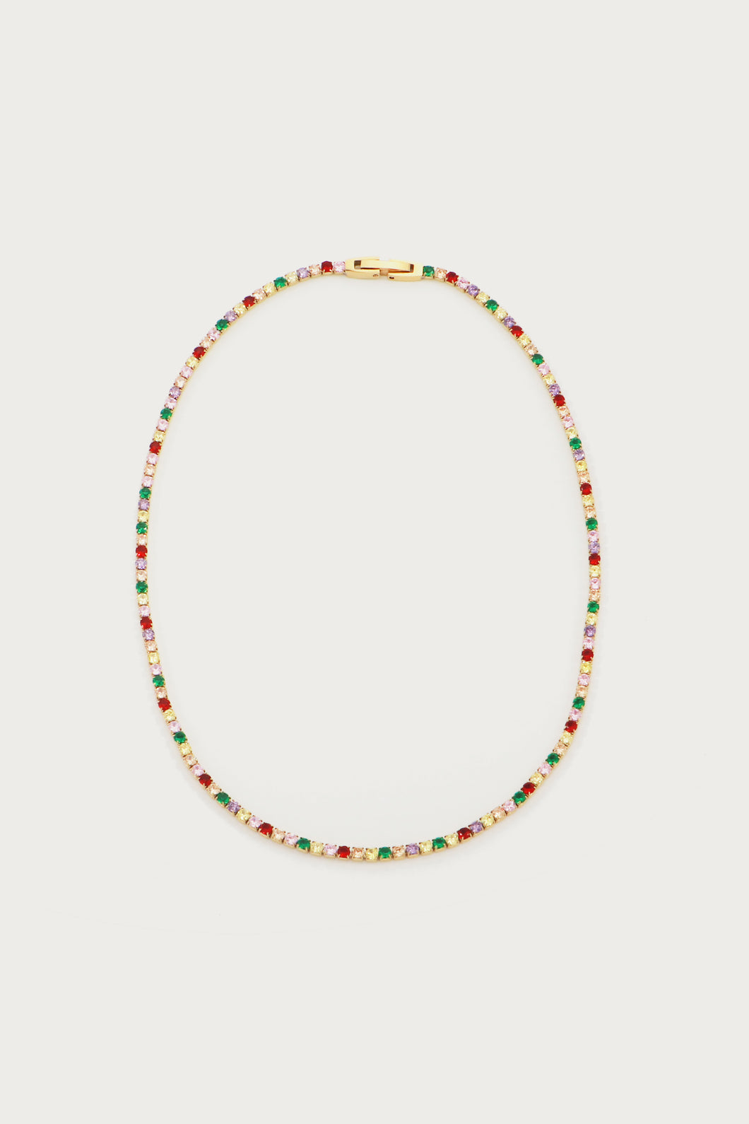 Introducing our stunning Rainbow Tennis Necklace – a dazzling fusion of vibrant hues that will elevate your style to new heights. This eye-catching necklace features a carefully curated selection of multicolored stones, each intricately set to create a mesmerizing rainbow effect. 