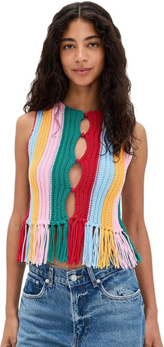 Woman wearing a colorful knitted vest with cut-out design on a white background