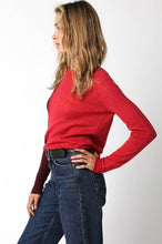 Load image into Gallery viewer, Woman wearing a crimson red sweater and blue jeans from Glam Expressway.
