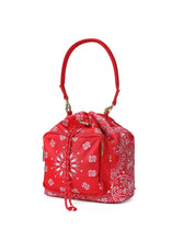 Load image into Gallery viewer, Red bandana print convertible bucket bag with drawstring closure and adjustable straps that can be worn as a backpack, shoulder bag, or crossbody bag.
