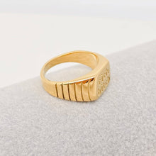 Load image into Gallery viewer, Chunky 18K gold-plated signet ring engraved with “rich bitch” and featuring ribbed detailing along the sides.
