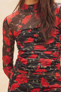 Red floral skirt and matching top with black background