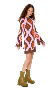 Glam Expressway's multi colored Fringe Knit Mini Dress is perfect for the season with a groovy new psychedelic pink and brown print, a lace-up back and a brown fringe trim. This fun dress is a wardrobe must have, made with 100% organic cotton for a cosy a luxurious feel. Wear the Fringe Knit Mini Dress whenever you want to stand out!