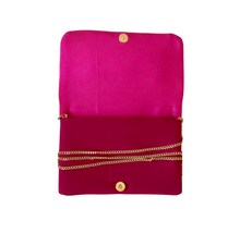 Load image into Gallery viewer, Pink and red clutch bag with gold chain detail on a white background
