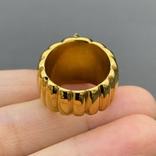 Load image into Gallery viewer, 18K gold-plated stainless steel statement ring with a large sparkling marquise-cut zircon center stone and sculpted ridged band.
