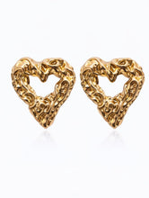 Load image into Gallery viewer, Textured gold heart-shaped statement stud earrings with sculptural molten finish.
