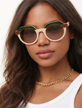 Load image into Gallery viewer, Round colorblock sunglasses with cream frame, green and brown accents, and tinted lenses.
