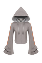 Load image into Gallery viewer, Dark gray fitted zip-up hoodie with orange sleeve stripes, oversized hood and dramatic layered ruffle bell sleeves.
