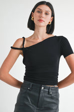 Load image into Gallery viewer, Woman wearing a black one-shoulder top and black leather pants on a white background
