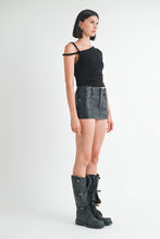 Load image into Gallery viewer, Woman wearing a black sleeveless top, gray leather skirt, and black knee-high boots on a white background
