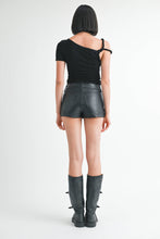 Load image into Gallery viewer, Person wearing a black top and leather shorts with gray boots on a white background
