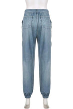 Load image into Gallery viewer, Upgrade your casual wardrobe with these Two-Tone Sweat Pants! Combining the look of denim with the comfort of joggers, these graphic long pants are a Y2K-inspired essential. Featuring a high-rise elastic waistband and a relaxed cargo-style fit, they’re perfect for an effortlessly cool, laid-back vibe.
