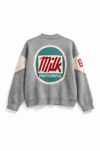 Load image into Gallery viewer, Gray sweater with a 'Milk Pasteurized' logo on a white background
