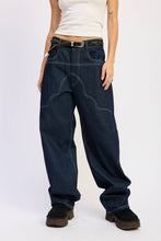 Load image into Gallery viewer, Person wearing dark blue jeans and a white top on a plain background
