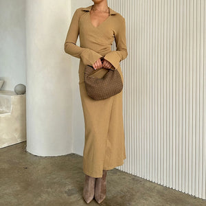Now in vegan suede, the Woven Leather Mushroom Round Bag continues to be a crowd favorite among trendsetters and lovers of cruelty-free fashion. This utterly luxe yet eco-friendly top-handle handbag is made with recycled vegan suede, so you can show off your style in a sustainable way.